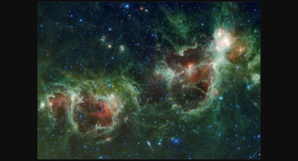 The Heart and Soul Nebulae glowing in deep space (NASA)